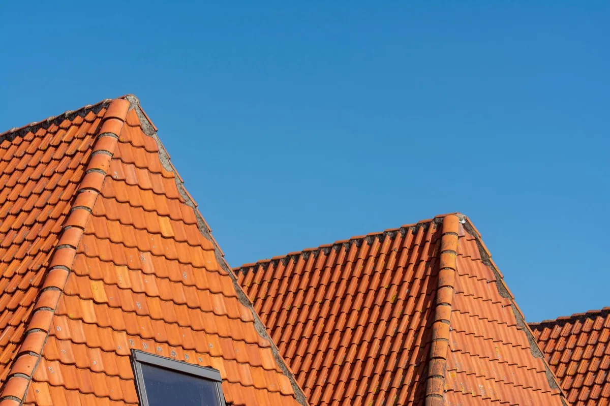 Clay barrel tile rooflines on homes in Madison, WI